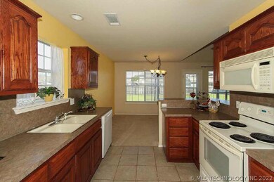 Kitchen w/ window over the sink.