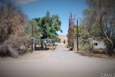 Front entrance off Post to asphalt driveway and co