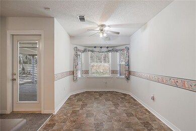 Dining Area and door leads to back Patio.