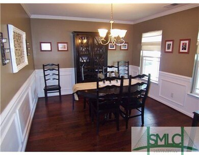 Dining Room. Dining Room features hardwood floors,