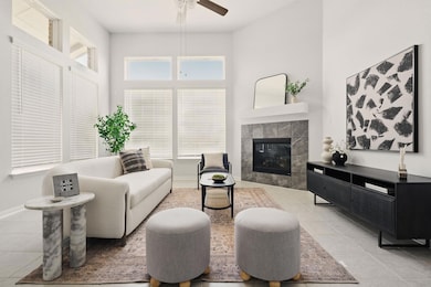 Living area featuring light tile patterned floori