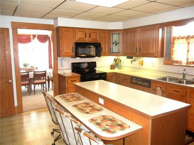 Big dream kitchen full of space and cabinets.