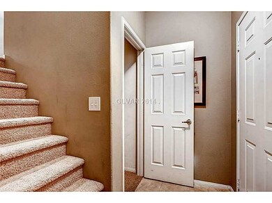 Property Photo. Inside the Front Door is Access to