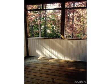 Screened porch overlooking backyard -