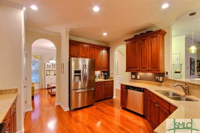 Modern stainless steel appliances.  Cabinets with 