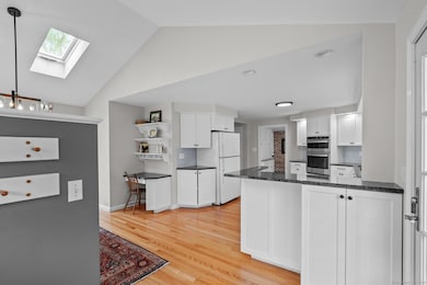 Welcoming side entrance brings you into the tastefully remodeled kitchen.
