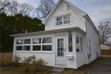 Exterior front with heated porch overlooking water