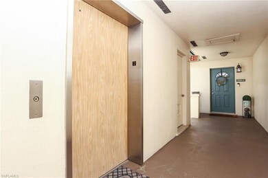 Hallway with elevator and finished concrete floori