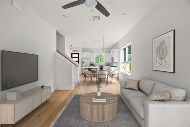 Living room featuring light wood-type flooring, v