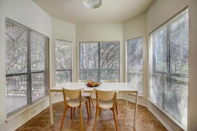Sunroom / solarium featuring tile patterned floor