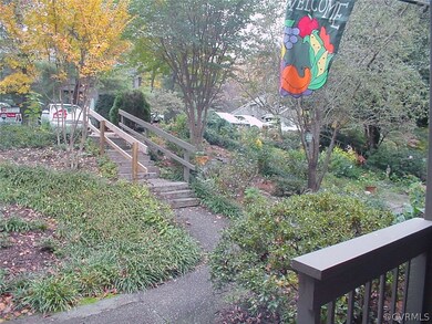 Front yard and steps to your parking place