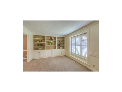 Convenient main level office with wall of built-in