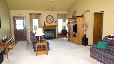 Roomy Living Room Opens to Sitting Area and Dining