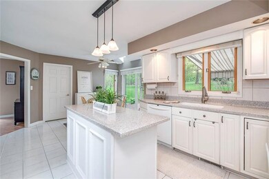 Recessed lighting and ceiling fan add to this brig