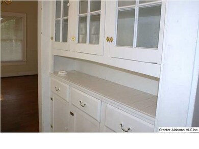 Built in china cabinet in breakfast nook.