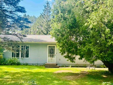View of front of property with a front lawn