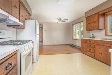 Newer appliances plus an open floor plan to informal dining area.