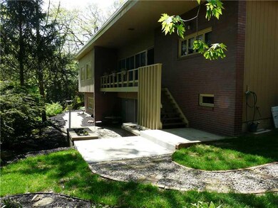 Exterior Back. Private wooded with multiple outdoo