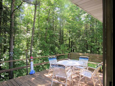 Pretty wooded back yard & big deck