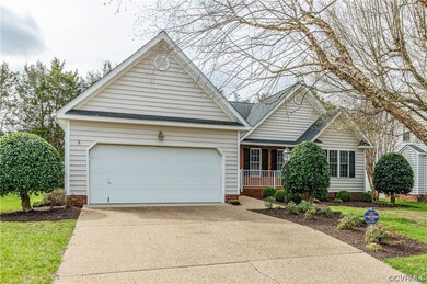 View of front of property featuring a front lawn,