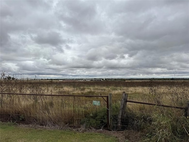View of yard with a rural view