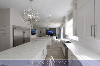Kitchen with a kitchen island, open floor plan, de