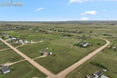 Aerial overview of property's location featuring rural landscape
