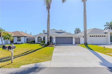 Ranch-style home with a garage and a front yard