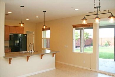 KITCHEN WITH BREAKFAST BAR SEATING