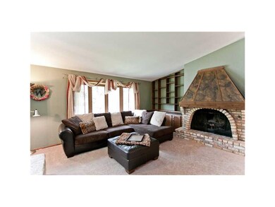 Living Room. Wood burning fireplace, brick surroun
