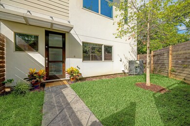 Fully fenced front yard, ample green space for kid