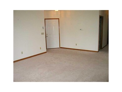 Living Room. View From Living Room Back to Entry D