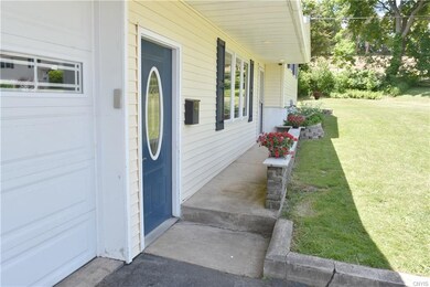 Front walkway welcomes you with the stone wall and