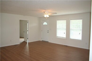 Open floor plan with 14x18 sqft great room. Lots of light filled rooms. Laminate floors.