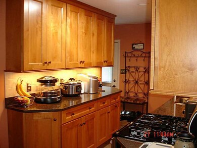 Kitchen. Quartz counter tops and custom maple cabi