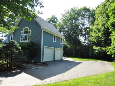 Huge 2 Car Heated & A/C Garage with Plenty of Park