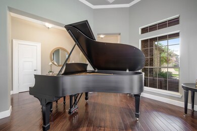 Formal dining room at front of home just off the entry.