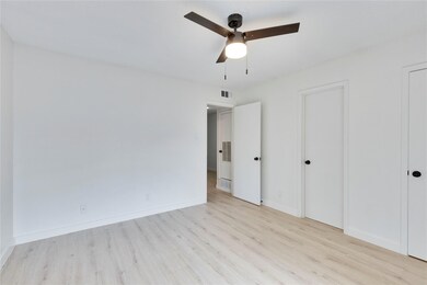 Unfurnished bedroom featuring wood finished floor