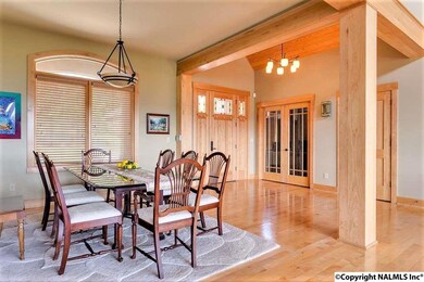 FROM THE FOYER, YOU WILL SEE THE BEAUTIFUL OPEN FLOOR PLAN INTO THE GREATROOM, KITCHEN, FRENCH DOORS TO THE LARGE OFFICE WITH BUILT IN SHELVES....