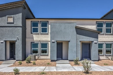 View of front of property featuring stucco siding