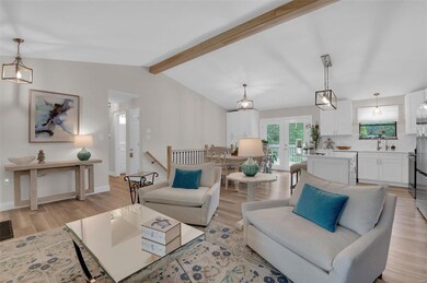 Vaulted Great Room - Open Floor Plan - Custom Kitchen - LVP throughout the main living areas on the main level and in the finished lower level.