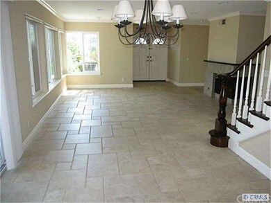 Vacant view of dining area into the living room