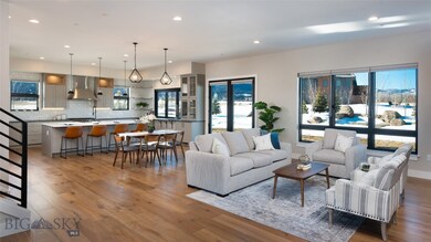 Grand living-dining-kitchen areas
