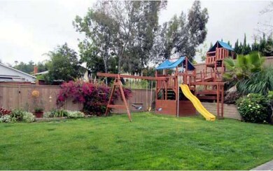 Large backyard with sprinklers and plenty of room 