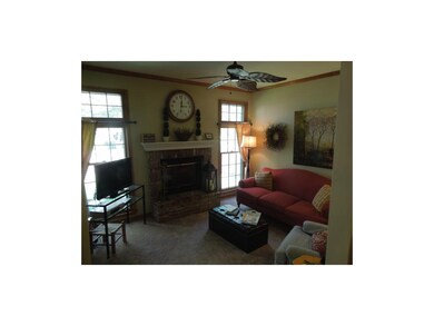 Hearth room right by kitchen.
