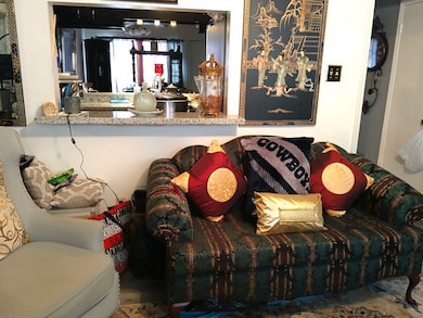 Formal Living with granite bar open to kitchen/breakfast areas