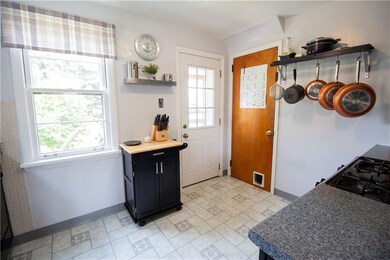 Kitchen with Doors to Back Porch and Basement