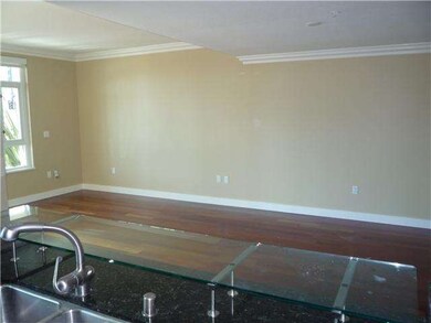 View from kitchen to open living/dining area