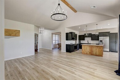 Kitchen featuring appliances with stainless steel 