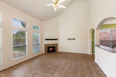 The Family room is large and has plenty of natural light looking into the backyard.